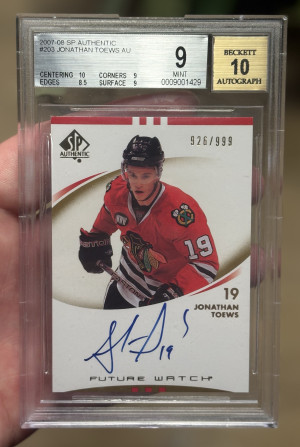 2007-08 Upper Deck Sp Authentic Future Watch Auto 926/999 #203 Jonathan Toews BGS 9 front