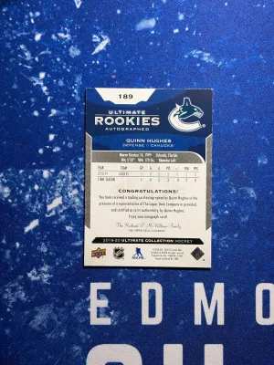Quinn Hughes Ultimate Rookie Auto /99 back