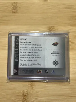 2024-25 Ultimate Jesper Wallstedt Ultimate Emblems Rookie Auto Silver #UER-JW Minnesota Wild back