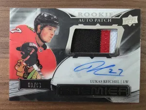 2022-23 Upper Deck Premier #AHR-LR Lukas Reichel Acetate Rookie Auto Patch 09/99 front