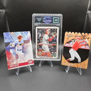 Shohei Ohtani Lot. Rookie, Die-cut And Santa Hat Variation Graded 10. front