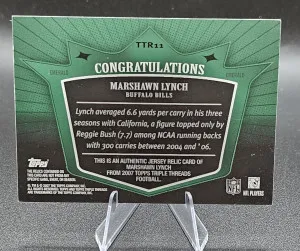 TTR11 Marshawn Lynch Triple Threads  Emerald  #/18 back