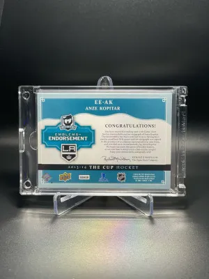 2013-14 The Cup Anze Kopitar Emblems Of Endorsement 4/15 back