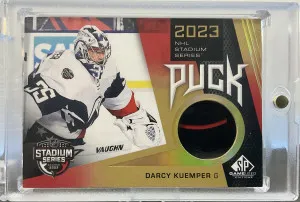 Darcy Kuemper 2023-24 SP Game Used Stadium Series Puck front