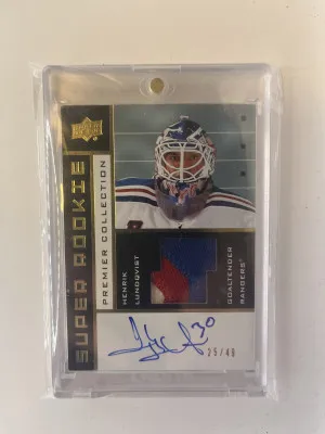 Henrik Lundqvist 2017 Upper Deck Premier 2002 Tribute Super Patch Auto /49. 3 color patch. front