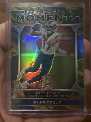 24 Spectra Spectacular Moments /10 Puka Nacua front