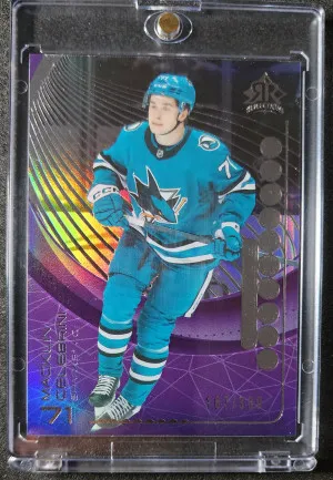 Macklin Celebrini Triple Dimensions /300 front