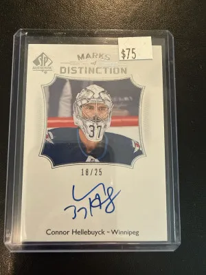 2021-22 SP Authentic Marks Of Distinction Connor Hellebuyck /25 front