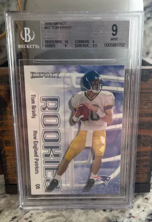 Tom Brady #27 2000 Skybox Impact Rookie Card BGS Mint 9 front