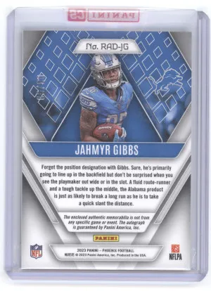 2023 Panini Phoenix Jahmyr Gibbs #RAD-JG Prime Blue Dual Jersey Auto 06/50 RC back