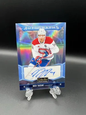 Nick Suzuki Platinum Blue Rainbow Auto front