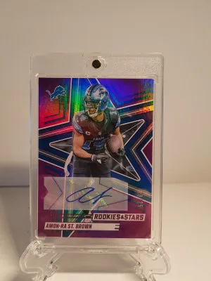 2025 Rookies And Stars Amon-Ra St. Brown Purple Auto /25 front