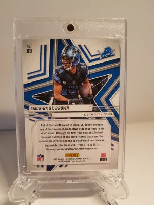 2025 Rookies And Stars Amon-Ra St. Brown Purple Auto /25 back