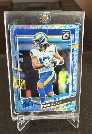 Puka Nacua 2023 Optic #238 Rocket /(SSP) Rookie RAW front