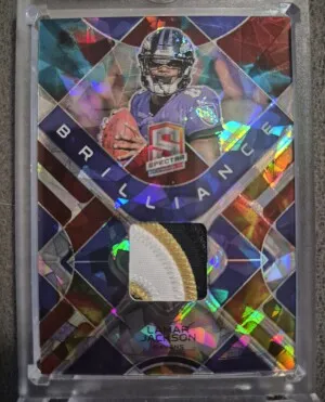 2023 Panini Spectra Astral Prizm Brilliance Lamar Jackson Patch 08/40 front