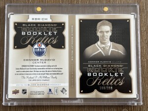 2015-16 Upper Deck Black Diamond Rookie Booklet Relics 109/299 #RBRCM Connor McDavid back