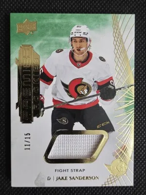 2022 23 Upper Deck Jake Sanderson Premier Rookies Fight Strap Patch /15 #147 front