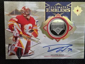23/24 2023 ULTIMATE COLLECTION DUSTIN WOLF UE-DW EMBLEMS ROOKIES GOLD AUTO /99 front