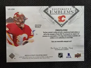 23/24 2023 ULTIMATE COLLECTION DUSTIN WOLF UE-DW EMBLEMS ROOKIES GOLD AUTO /99 back