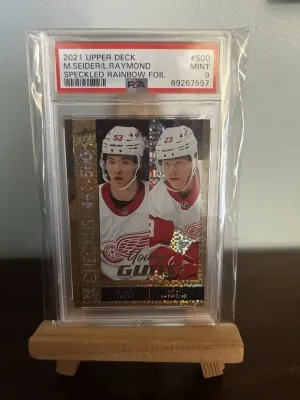 2021-22 Series 2 Seider / Raymond Speckled Rainbow Foil Young Guns Checklist #500 PSA 9 front