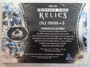 2022-23 Upper Deck Black Diamond Diamond Mine Relics Cale Makar Jersey #DMR-MA back