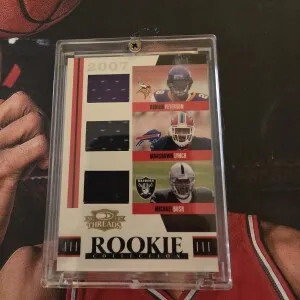 2007 Threads Adrian Peterson, Marshawn Lynch, Michael Bush Rookie Collection Jersey /500 front