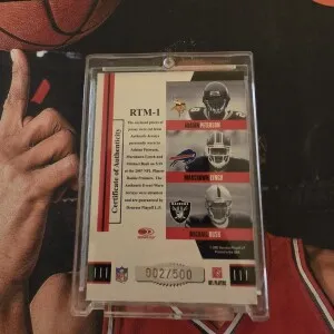 2007 Threads Adrian Peterson, Marshawn Lynch, Michael Bush Rookie Collection Jersey /500 back