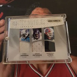 2009 Ultimate Collection Adrian Peterson, Marshawn Lynch, Chris Johnson, Steve Slaton,Brian Westbrook, Matt Forte Ultimate Jerseys  /99 back