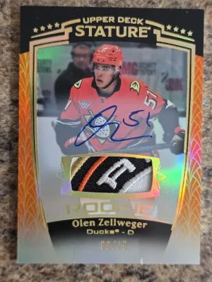 2024-25 UD Stature Hockey Red #44 Olen Zellweger RPA RC 3-Color Patch AUTO /15 Premium Auto Orange front