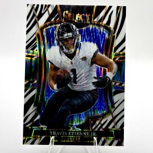 2025 Panini Select - Premier Level Travis Etienne #130 Zebra Prizm front