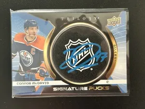2023-24 Trilogy Signature Pucks Connor McDavid #SP-CM (3/3) front