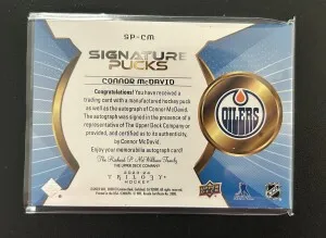 2023-24 Trilogy Signature Pucks Connor McDavid #SP-CM (3/3) back