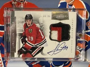 2011-12 Dominion Jonathan Toews Patch Autograph /60 front