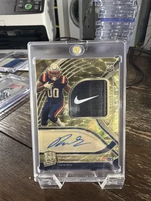 2021 Panini Spectra #233 Rhamondre Stevenson Rookie Patch Autographs Gold #/1 front