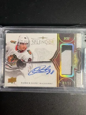 2017-18 Upper Deck Splendor Patrick Kane Patch Auto /11 Sealed Encased front
