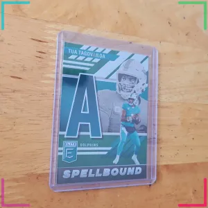 2023 Panini Donruss Elite #SB-TT6 Tua Tagovailoa Spellbound "A" Green