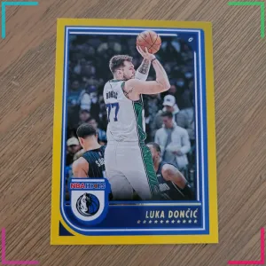 2022-23 Panini NBA Hoops Luka Doncic Yellow Flood #119 MAVERICKS Dallas