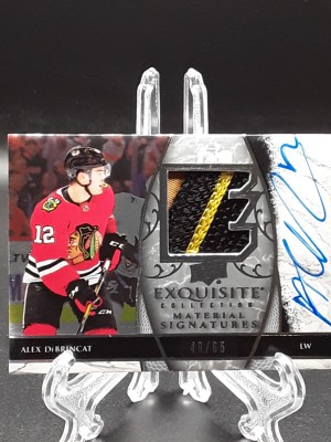 2019-20 Exquisite Alex DeBrincat Material Signatures Game Used Patch Auto /65