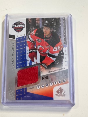 25/26 SP Game used Jack Hughes Global Series Fabrics